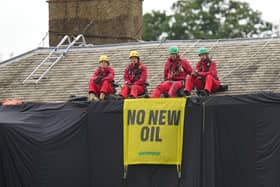Greenpeace activists on the roof of Prime Minister Rishi Sunak's house in Richmond, North Yorkshire. PIC: Danny Lawson/PA Wire
