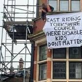 A man protesting on the roof of County Hall, Cross Street, Beverley, on Wednesday, April 3.