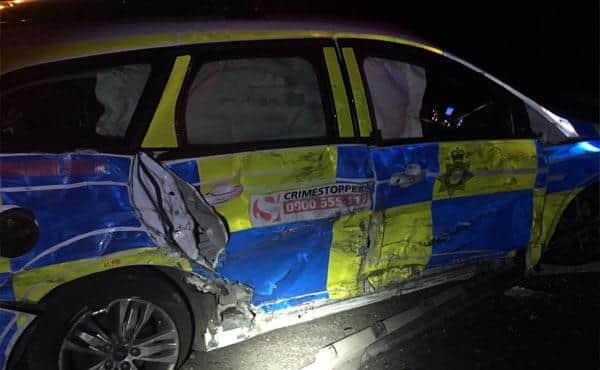 Damage to the police car that John Wickson hit in his lorry
