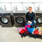 Xeros chief executive Neil Austin, with a jar of Xorbs, which are released into the washing machine drum during a wash cycle to help reduce the amount of water used. Picture: James Hardisty.