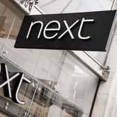 High street retailer Next has raised its full-year profit forecast for the fourth time this year after better than expected sales, despite unusually warm weather affecting demand for autumn ranges. (Photo by Ian West/PA Wire)