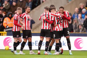 LONDON, ENGLAND - JANUARY 07: Daniel Jebbison of Sheffield United celebrates with team mates after scoring their sides first goal during the Emirates FA Cup Third Round match between Millwall FC and Sheffield United at The Den on January 07, 2023 in London, England. (Photo by Warren Little/Getty Images)