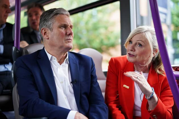 Labour Leader, Keir Starmer chats with Tracy Brabin, Mayor of West Yorkshire as they travel by bus. PIC: Ian Forsyth/Getty Images