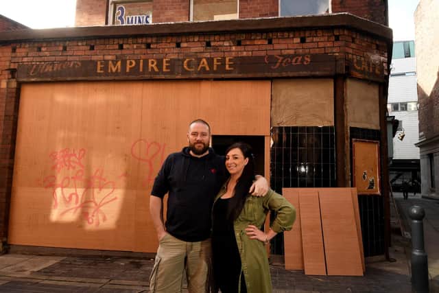 Sam Pullen with his partner Nicole Deighton pictured outside the old Empire Cafe on Fish Street, Leeds. .Picture by Simon Hulme 10th October 2022










