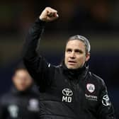OXFORD, ENGLAND - FEBRUARY 01: Michael Duff, Manager of Barnsley, celebrates following the team's victory after the Sky Bet League One between Oxford United and Barnsley at Kassam Stadium on February 01, 2023 in Oxford, England. (Photo by Richard Heathcote/Getty Images)