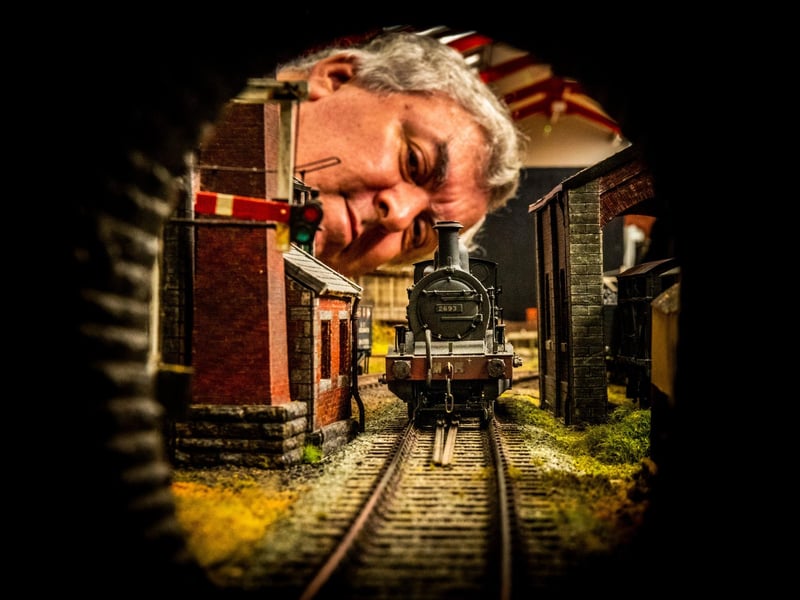David Smith, a member of the Keighley Model Railway Club kept a close eye on one of their locomotives as it headed towards a tunnel on their '0 gauge' - Pucklechurch layout, based near Bristol.