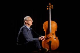Kegan Harrison, Scientific & Musical Instruments Specialist at Tennants Auction Centre in Leyburn with a Cello, sold with a letter describing it as 'An old late 18th cello attributed to Vincenzo Panormo'. Photographed by Tony Johnson for The Yorkshire Post.