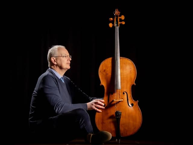 Kegan Harrison, Scientific & Musical Instruments Specialist at Tennants Auction Centre in Leyburn with a Cello, sold with a letter describing it as 'An old late 18th cello attributed to Vincenzo Panormo'. Photographed by Tony Johnson for The Yorkshire Post.