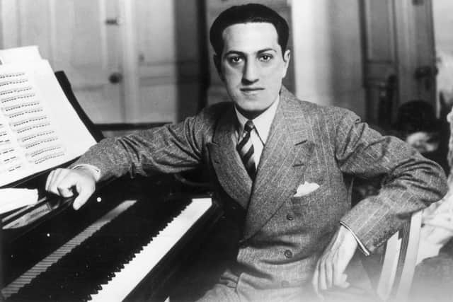 Songwriter George Gershwin (1898 - 1937) at a piano. (Photo by Evening Standard/Getty Images)