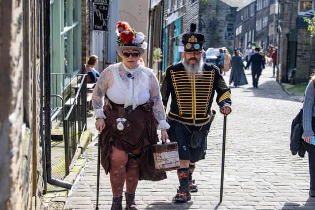 Visitors in costume at the Haworth Steampunk weekender photographed for the Yorkshire Post by Tony Johnson. 7th October 2023