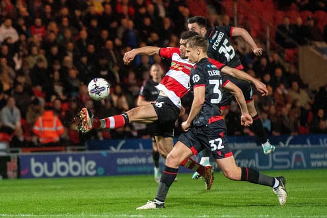 TRUYING HIS LUCK: Maxime Biamou gets a shot in for Doncaster Rovers