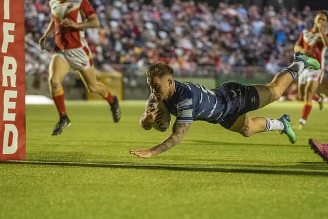 Morgan Smith scores a try for Featherstone Rovers against Sheffield Eagles. (Picture by Dec Hayes)