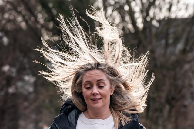 A woman in windy conditions in Leeds as Storm Jocelyn moved across the UK.