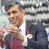 Prime Minister Rishi Sunak during a visit to a branch of Timpson. PIC: Yui Mok/PA Wire