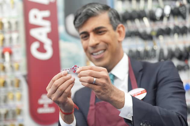 Prime Minister Rishi Sunak during a visit to a branch of Timpson. PIC: Yui Mok/PA Wire