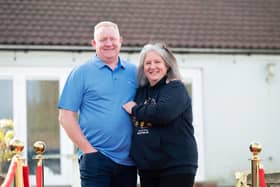 Meg Carr and her husband Andy outside their historic home in Sherburn-in-Elmet