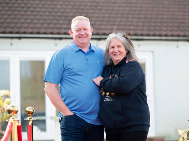 Meg Carr and her husband Andy outside their historic home in Sherburn-in-Elmet