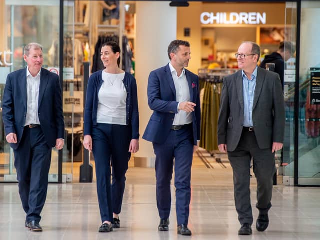 Taking a stroll through Lincoln’s Waterside Shopping Centre, from left, David Donkin of Wykeland Group; Lincolnshire Co-op’s Hayley Woodhouse; Dominic Gibbons of Wykeland; and Kevin Kendall, of Lincolnshire Co-op. Picture: John Aron