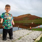 Luke Mortimer, a selfless ten-year-old quad amputee, at the bottom of Embsay Crag, in North Yorkshire.