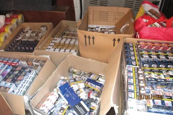 The van, containing £43,000 worth of counterfeit cigarettes, was found at the rear of Maxi Foods on June 16. Picture from West Yorkshire Police.