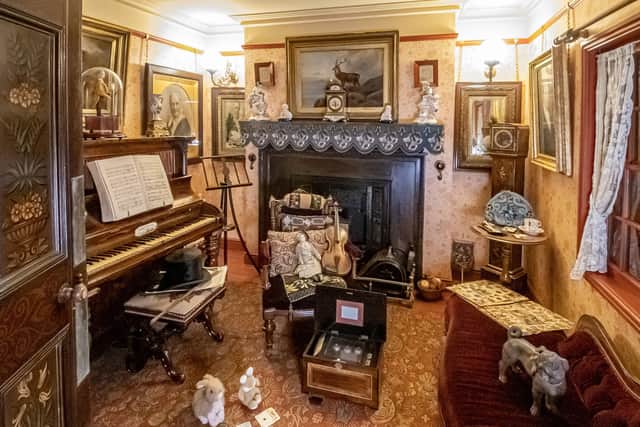A  front room, one of the many rooms of Victorian homes and business's which feature in the recreated period streets at the Abbey House Museum in Leeds photographed for The Yorkshire Post by Tony Johnson.