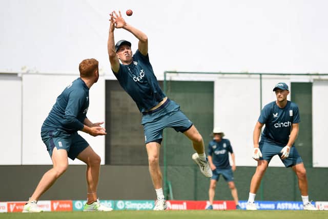CATCH IT: England's Zak Crawley practicing in the slips alongside Jonathan Bairstow and Joe Root during a nets session  in Ranchi Picture: Gareth Copley/Getty Images