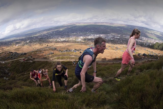 Runners race along the hills above Ilkley.