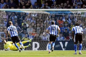 Sheffield Wednesday's Michael Smith scores their side's first goal of the game from a penalty during the Sky Bet League One match at Hillsborough Stadium, Sheffield. Picture date: Sunday May 7, 2023. PA Photo. See PA Story SOCCER Sheff Wed. Photo credit should read: Richard Sellers/PA Wire.

RESTRICTIONS: EDITORIAL USE ONLY No use with unauthorised audio, video, data, fixture lists, club/league logos or "live" services. Online in-match use limited to 120 images, no video emulation. No use in betting, games or single club/league/player publications.