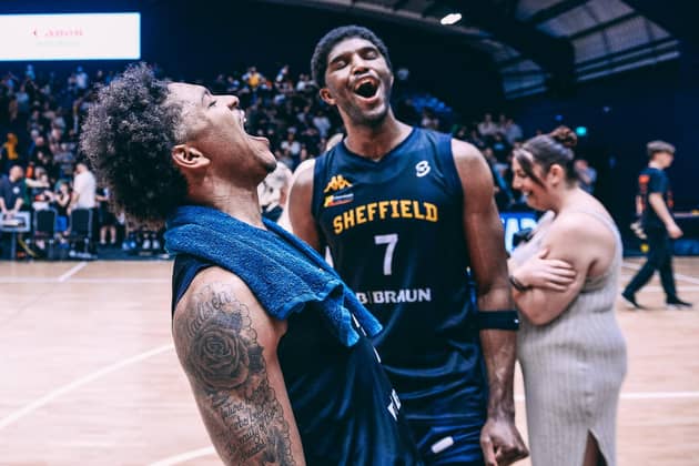 Delight: Sheffield Sharks duo Prentiss Nixon, left, and Kipper Nichols celebrate a landmark play-off success over Leicester Riders (Picture: Adam Bates)