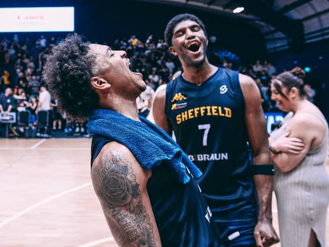 Delight: Sheffield Sharks duo Prentiss Nixon, left, and Kipper Nichols celebrate a landmark play-off success over Leicester Riders (Picture: Adam Bates)