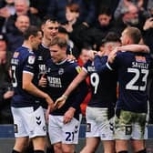 Millwall's Tom Bradshaw (second right) celebrates scoring their side's third goal of the game, completing his hat-trick, during the Sky Bet Championship match at The Den, London. Picture: Victoria Jones/PA Wire