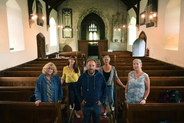 Julian Woodford organiser of this year's 5th High Wolds Poetry Festival at North Dalton's All Saints Church. Pictured with poets from left, Vicky Sewell, Alison Stark, Yvie Holder and Jane Meredith.
Photographed by Yorkshire Post photographer Jonathan Gawthorpe.
15th August 2023. 