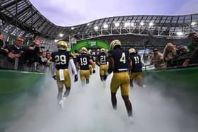Notre Dame take to the field during the Aer Lingus College Football Classic game between Notre Dame and Navy at Aviva Stadium on August 26, 2023 in Dublin, Ireland. The event brought 69 million euros into the local economy (Picture: Charles McQuillan/Getty Images)