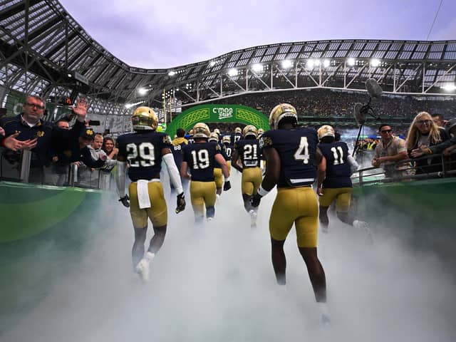 Notre Dame take to the field during the Aer Lingus College Football Classic game between Notre Dame and Navy at Aviva Stadium on August 26, 2023 in Dublin, Ireland. The event brought 69 million euros into the local economy (Picture: Charles McQuillan/Getty Images)