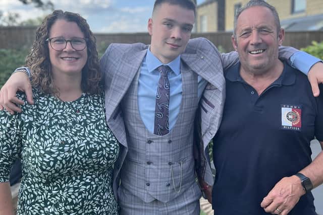 Henry Grierson with his parents.