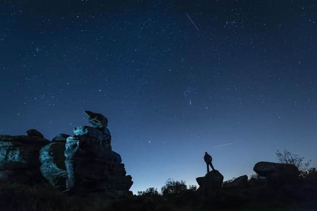 A man stargazing at Brimham Rocks, Harrogate. (Pic credit: Danny Lawson / PA Wire)