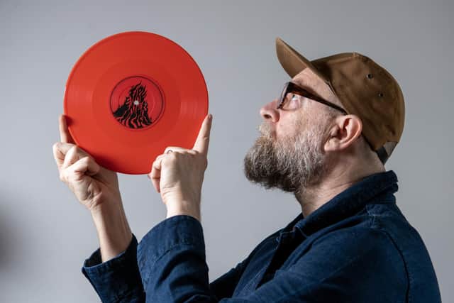 Sheffield musician and producer Dean Honer who has co-authored new guide to 101 of the world's best hot sauces, and also produced a vinyl record (appropriately coloured) The Hot Sauce Experience by  The Fire Eaters, photographed for The Yorkshire Post Magazine by Tony Johnson