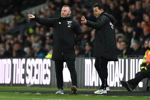LEARNING CURVE: Liam Rosenior (right) assisted Wayne Rooney at Derby County