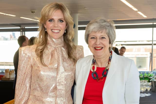 Cleo Watson with former prime minister Theresa May at her book launch. Picture: Jeff Moore/PA Photo.