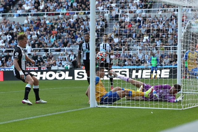Mohamed Elyounoussi of Southampton scores their sides first goal past Martin Dubravka of Newcastle United during the Premier League match between Newcastle United  and  Southampton at St. James Park on August 28, 2021 in Newcastle upon Tyne, England.