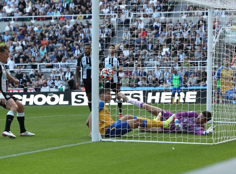 Mohamed Elyounoussi of Southampton scores their sides first goal past Martin Dubravka of Newcastle United during the Premier League match between Newcastle United  and  Southampton at St. James Park on August 28, 2021 in Newcastle upon Tyne, England.