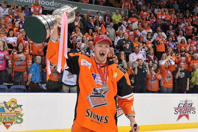 WINNER: Davey Phillips celebrates winning the 2017 Elite League play-off trophy with Sheffield Steelers. Picture courtesy of Dean Woolley.