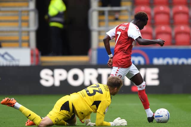 Rotherham United's Fabio Tavares rounds Chesterfield's Ryan Boot to open the scoring. Picture: Jonathan Gawthorpe