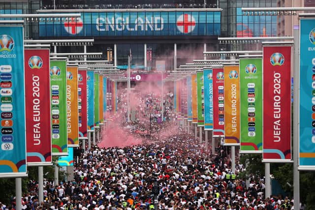 A general view outside the stadium along Wembley Way as fans enjoy the pre match atmosphere prior to the UEFA Euro 2020 Championship Final between Italy and England. (Picture: Alex Pantling/Getty Images)