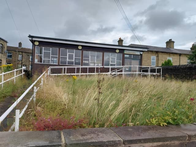 The former library with permission to demolish and build a new home on the site