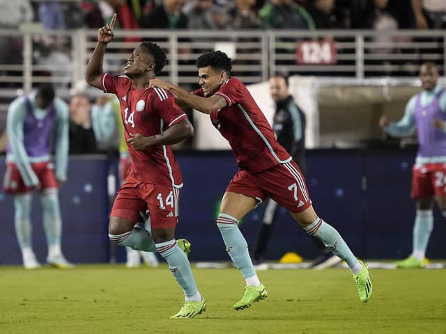 SANTA CLARA, CALIFORNIA - SEPTEMBER 27: Luis Sinisterra and Luis Diaz of Columbia celebrate Sinisterra's second goal against Mexico in the second half of the Mextour Send Off at Levi's Stadium on September 27, 2022 in Santa Clara, California. Columbia won the game 3-2. (Photo by Thearon W. Henderson/Getty Images)