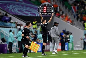 The fourth official shows the amount of added time for the first half during the FIFA World Cup Qatar 2022 Group A match between Senegal and Netherlands at Al Thumama Stadium on November 21. (Picture: Claudio Villa/Getty Images)