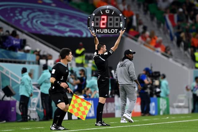 The fourth official shows the amount of added time for the first half during the FIFA World Cup Qatar 2022 Group A match between Senegal and Netherlands at Al Thumama Stadium on November 21. (Picture: Claudio Villa/Getty Images)