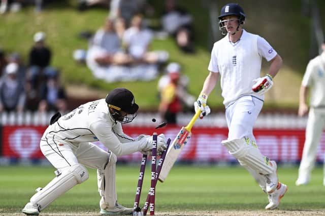 ON YOUR WAY: New Zealand's Tom Blundell, left, runs out England's Harry Brook on day 5 in Wellington Picture: Andrew Cornaga/Photosport via AP