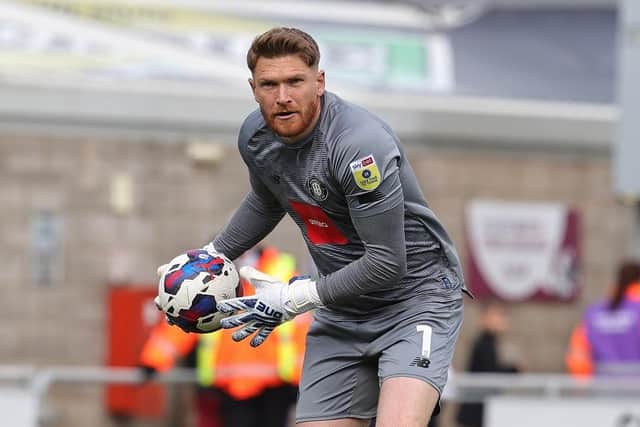 KEEP IT SAFE: Goalkeeper Mark Oxley made some key second-half saves to ensure Harrogate Town held out for a 2-1 win at Mansfield Town Picture: Pete Norton/Getty Images